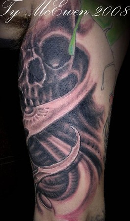 Ty McEwen - bio-organic skull tattoo